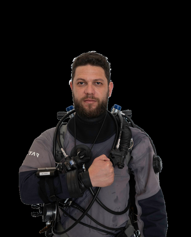Low on gas hand signal, fist tapping chest